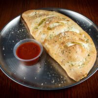 Calzone, GoGo Pizza, Calzone & Stromboli, baked Italian turnover, ricotta and mozzarella filling, golden crust calzone, hearty Italian dish, fresh baked calzone, gourmet calzone, oven baked perfection, stuffed Italian bread, cheesy calzone, best calzone in town