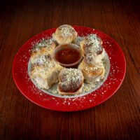 Garlic Knots (6pc), GoGo Pizza, Appetizers, GoGo Favorite, garlic butter bread, fresh baked garlic knots, soft bread knots, herbed bread appetizer, gourmet garlic bread, pizza side dish, oven baked knots, best garlic knots near me, buttery bread snack