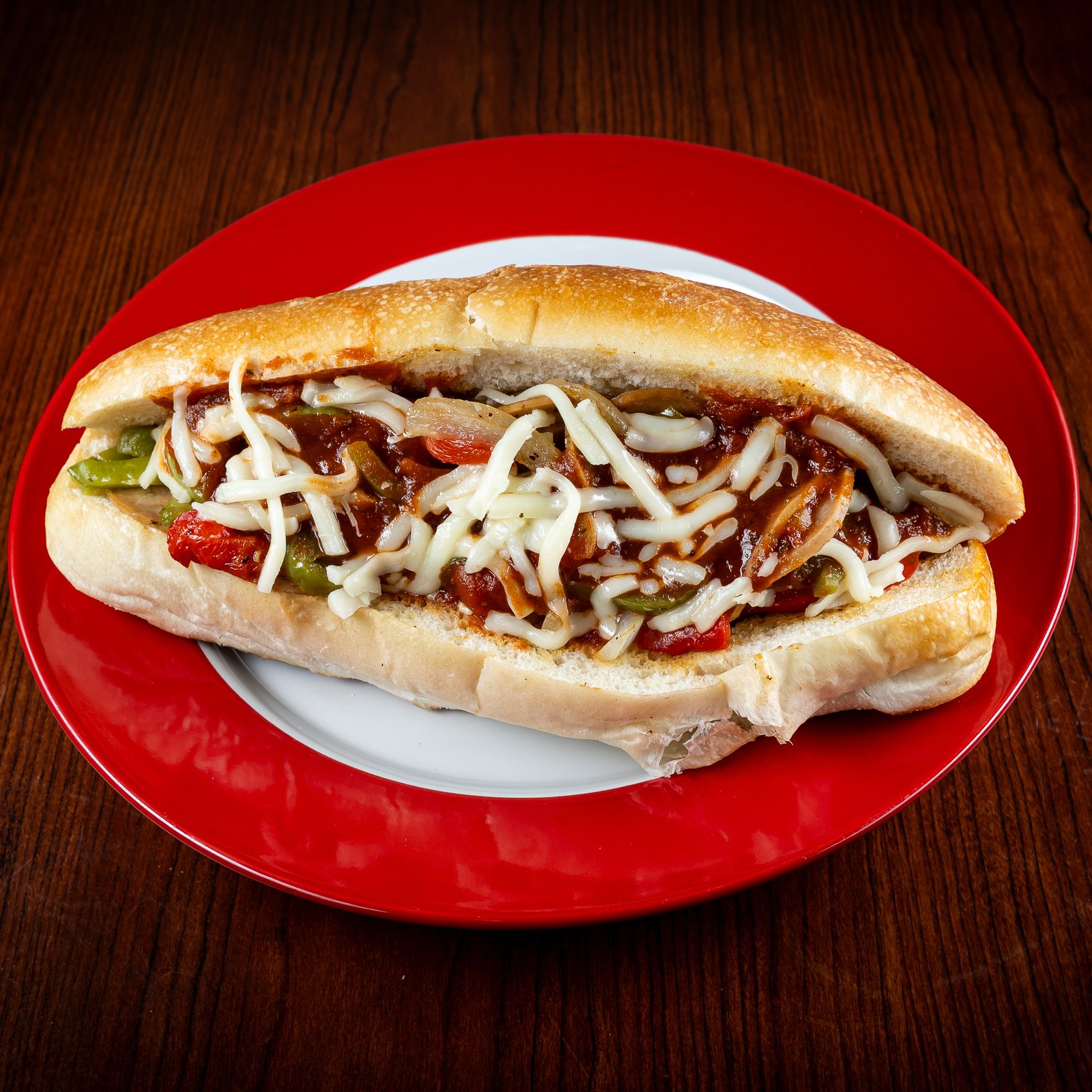 Italian Sausage Sub, GoGo Pizza, Subs, sausage and peppers sandwich, cheesy sausage sub, toasted Italian sub, gourmet hot sandwich, hearty sausage hoagie, best Italian sausage sub near me, grilled sausage sandwich, comfort food sub, hot sausage roll