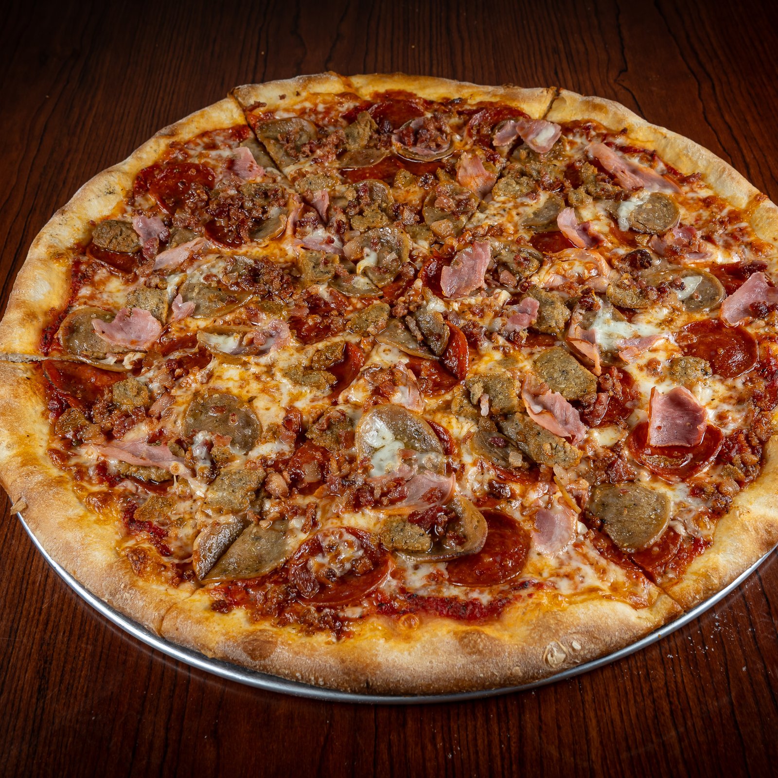 Meat Lovers Speciality Pizza, GoGo Pizza, GoGo Favorite, Speciality Pizza, loaded meat pizza, pepperoni sausage pizza, ham and bacon pizza, hearty pizza, stone baked pizza, mozzarella cheese pizza, gourmet pizza, ultimate meat pizza, Italian meat pizza, best meat lovers pizza