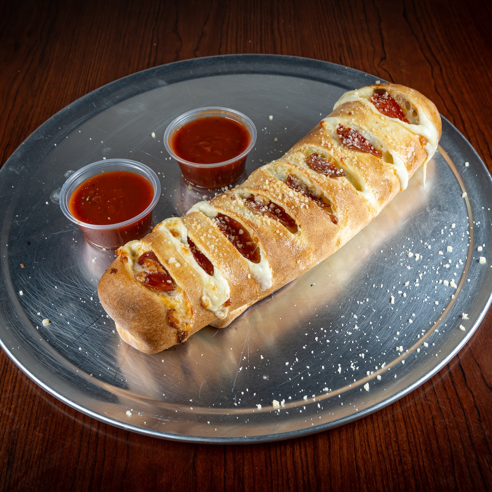 Stromboli, GoGo Pizza, Calzone & Stromboli, Italian stuffed bread, mozzarella cheese filling, oven baked stromboli, hearty Italian dish, gourmet stromboli, fresh baked crust, loaded with toppings, classic Italian recipe, meat and cheese stromboli, best stromboli near me